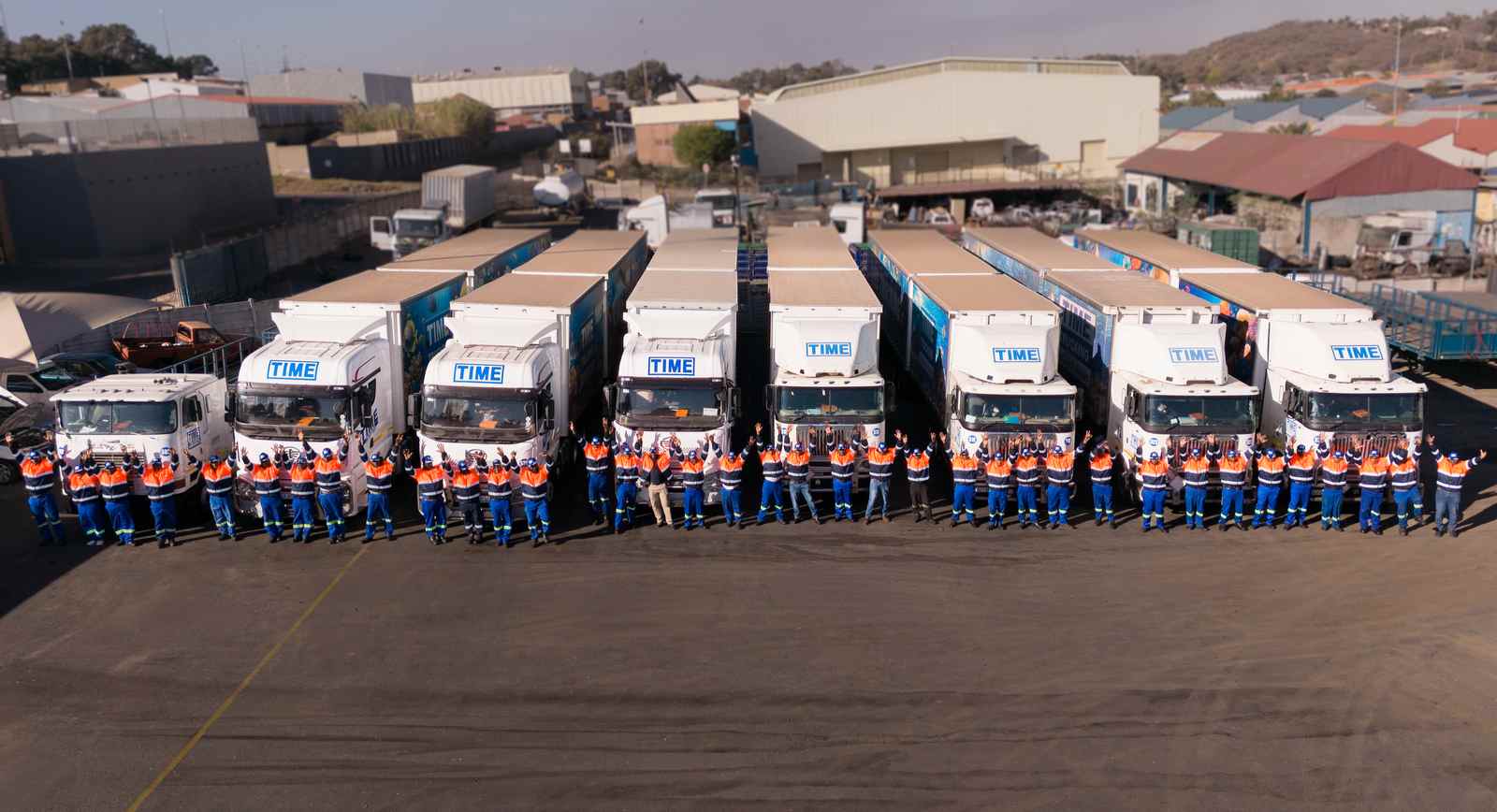 TIME Trucking fleet and team at the depot